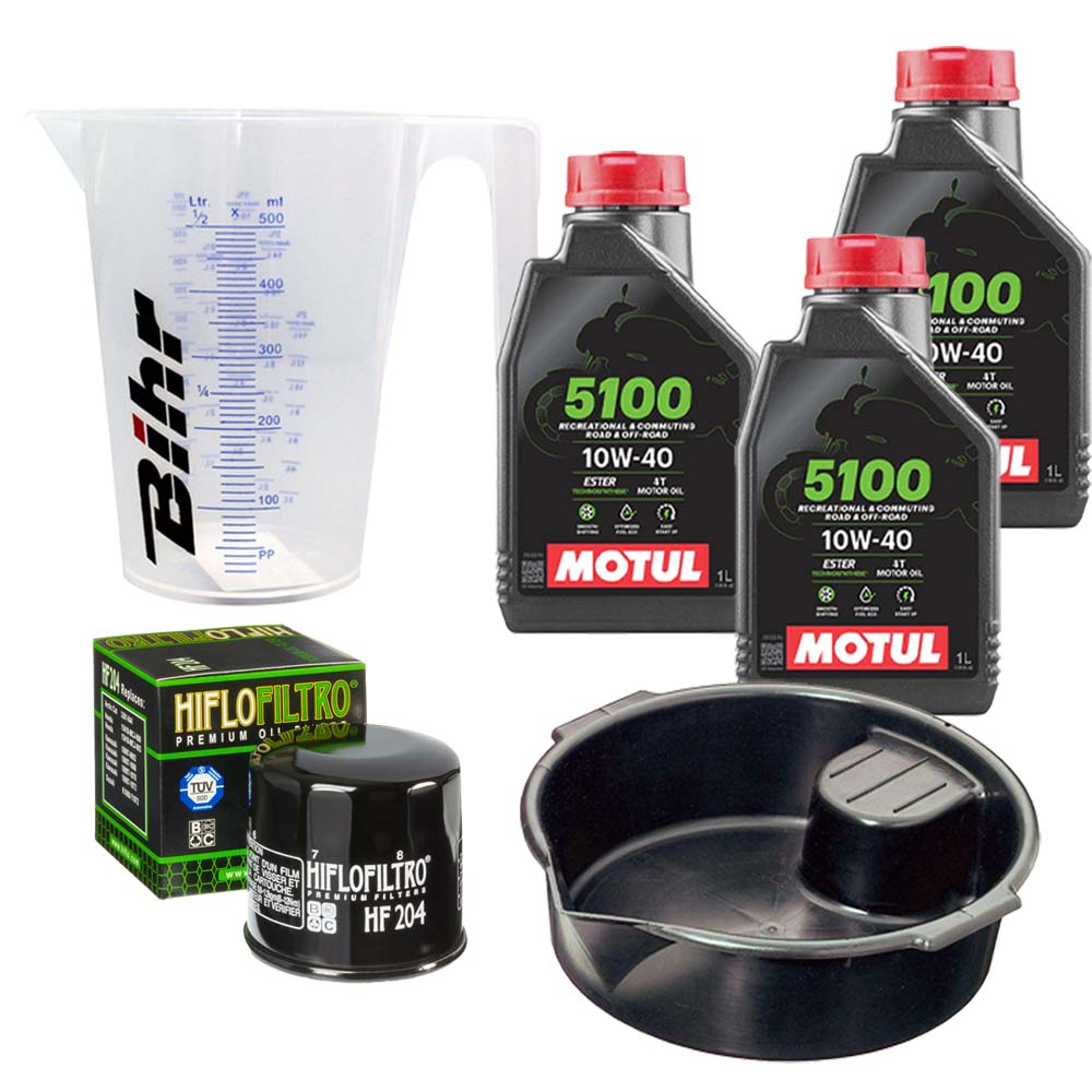 Kit vidange version premium avec 3 bidons d'huile MOTUL 5100 10W40, un filtre HF 204, un doseur Bihr gradué et un bac de récupération