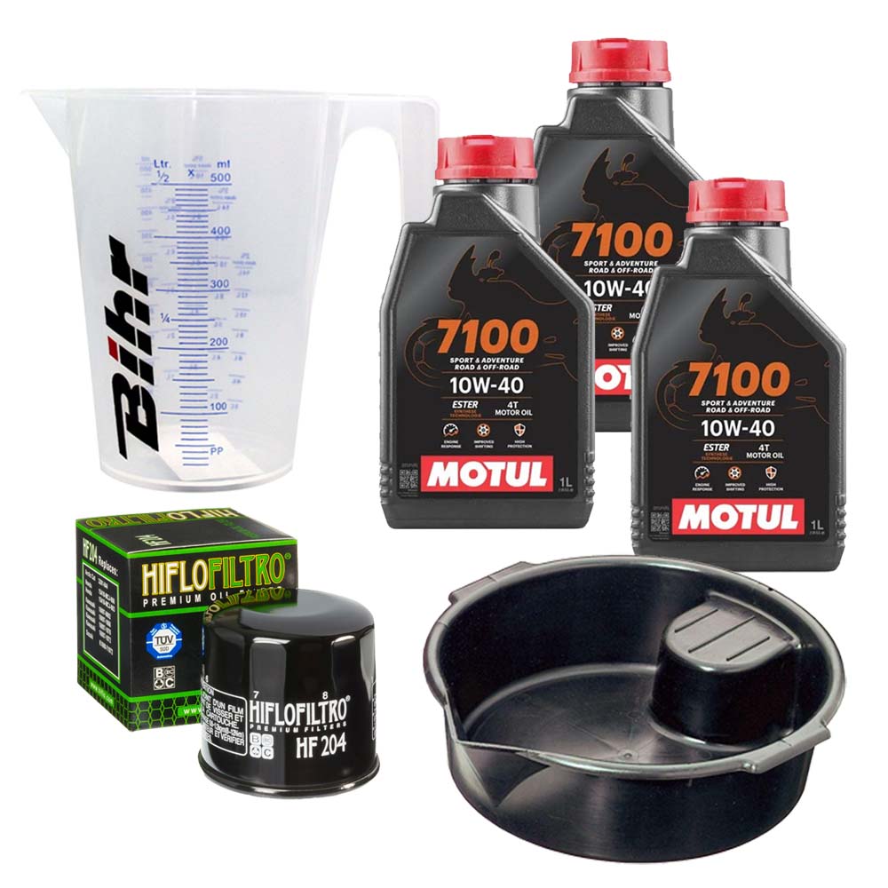 Kit vidange version premium avec 3 bidons d'huile MOTUL 7100 10W40, un filtre HF 204, un doseur Bihr gradué et un bac de récupération
