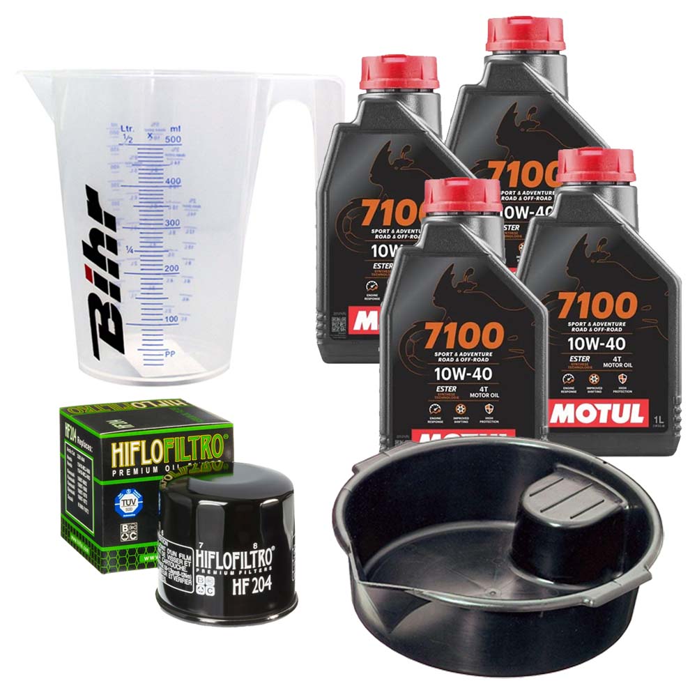 Kit vidange version premium avec 4 bidons d'huile MOTUL 7100 10W40, un filtre HF 204, un doseur Bihr gradué et un bac de récupération