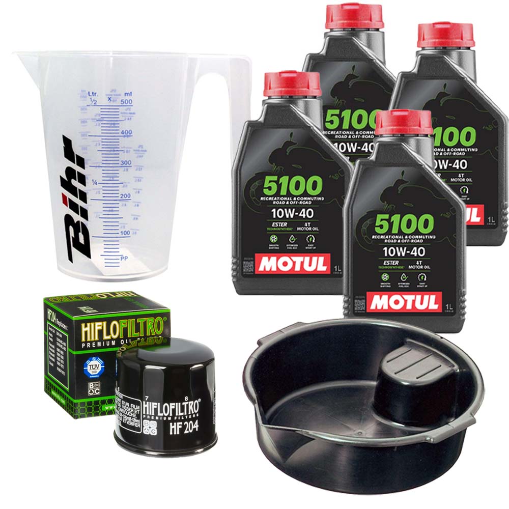 Kit vidange version premium avec 4 bidons d'huile MOTUL 5100 10W40, un filtre HF 204, un doseur Bihr gradué et un bac de récupération