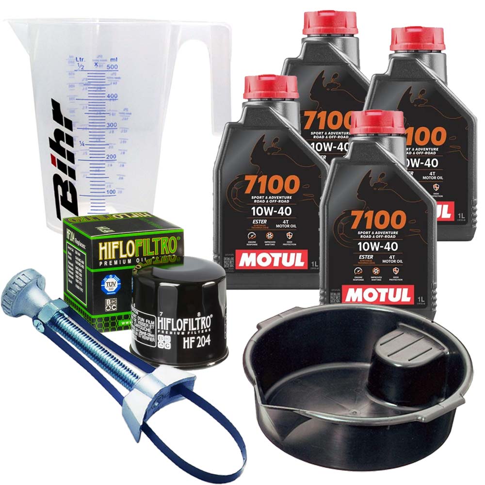 Kit vidange version pro avec 4 bidons d'huile MOTUL 7100 10W40, un filtre HF 204, un doseur Bihr gradué, un bac de récupération et une clé démonte-filtre